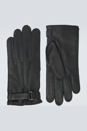 Elevate your style with our premium Embossed Leather Gloves. Crafted from genuine leather and featuring intricate embossing, these gloves offer both durability and a sophisticated look. Some styles include touch-sensitive technology, allowing you to use your devices without removing them. Perfect for adding a touch of class and functionality to your wardrobe. 1 Elevate your style with our premium Embossed Leather Gloves. Crafted from genuine leather and featuring intricate embossing, these gloves offer both durability and a sophisticated look. Some styles include touch-sensitive technology, allowing you to use your devices without removing them. Perfect for adding a touch of class and functionality to your wardrobe.