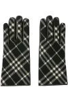 Luxury Check Wool Cashmere Gloves | Burberry Black/Calico Beige

Elevate your winter style with these iconic Check Wool Cashmere Gloves from Burberry. Crafted in Italy, these designer gloves feature a blend of premium wool and soft cashmere, backed with supple grainy calf leather on the palm for a secure grip. Finished with a logo-engraved metal stud and luxuriously lined in cashmere silk, these gloves offer supreme warmth and a press-stud closure for a perfect fit. Ideal for sophisticated warmth and an unmistakable heritage look.