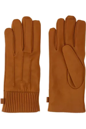 Discover our premium lined top-stitched gloves for ultimate warmth and style. Durable, comfortable, and perfect for winter. Shop now!