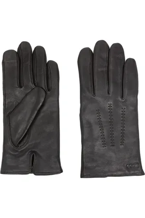 Premium Logo-Lettering Leather Gloves: Durable & Stylish for Everyday Wear. Crafted from high-quality leather, these gloves offer superior comfort and protection while showcasing sophisticated logo lettering. Perfect for drivers and cold weather.